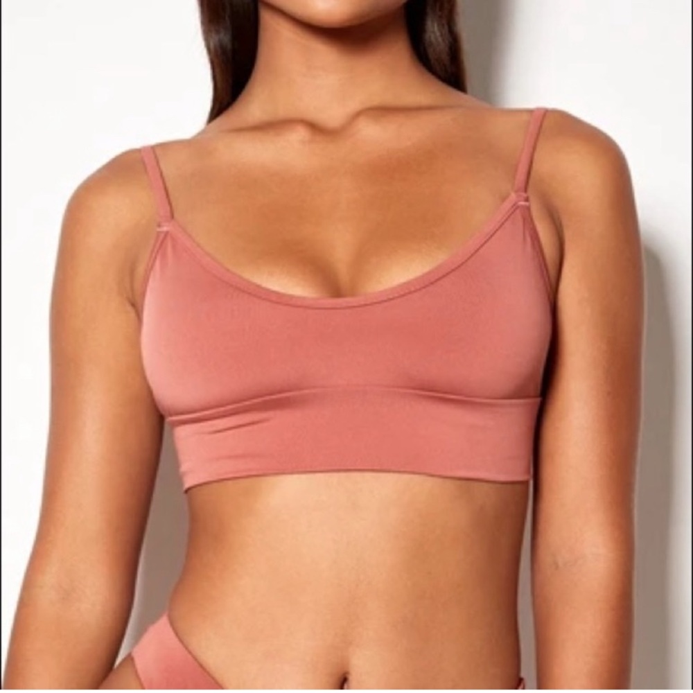 Women's gooseberry swim top. Burnt yellow in color. Size large